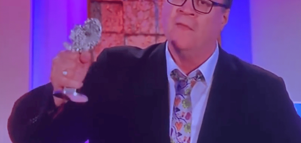 Russell T Davies accepts It's a Sin's award for best TV drama at the South Bank Sky Arts Awards