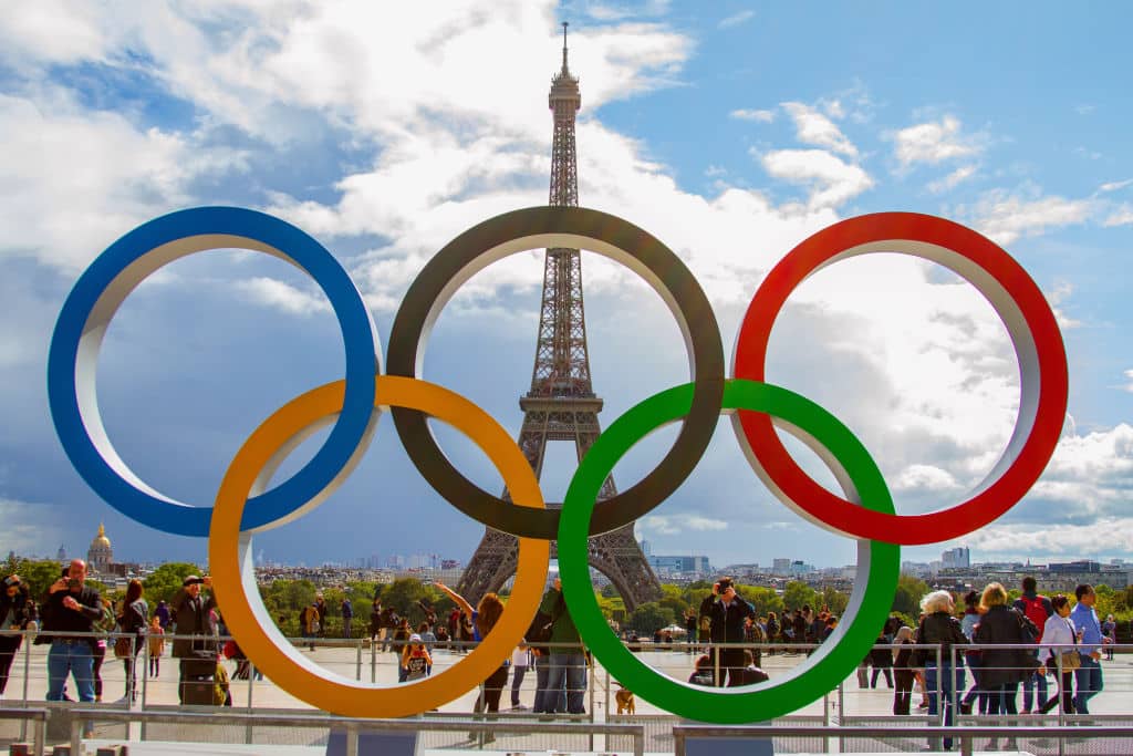 The Olympic rings placed in front of the Eiffel Tower