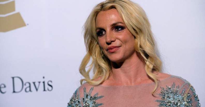 Britney Spears poses for a photo at an event