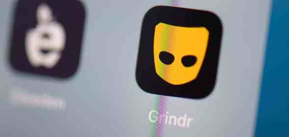 This illustration picture taken on July 24, 2019 in Paris shows the logo of the US social networking application Grindr on the screen of a tablet.