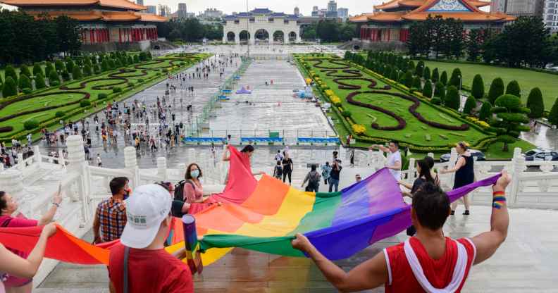 In this photograph, thousands of people march through Taipei during Taipei Pride