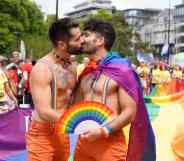 Two men share a kiss at London Pride