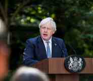 In this photograph Boris Johnson speaks behind a podium