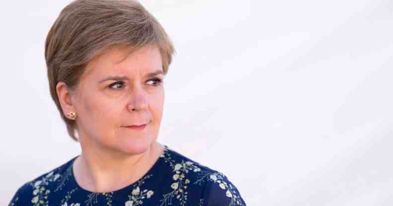 Nicola Sturgeon looks to the left