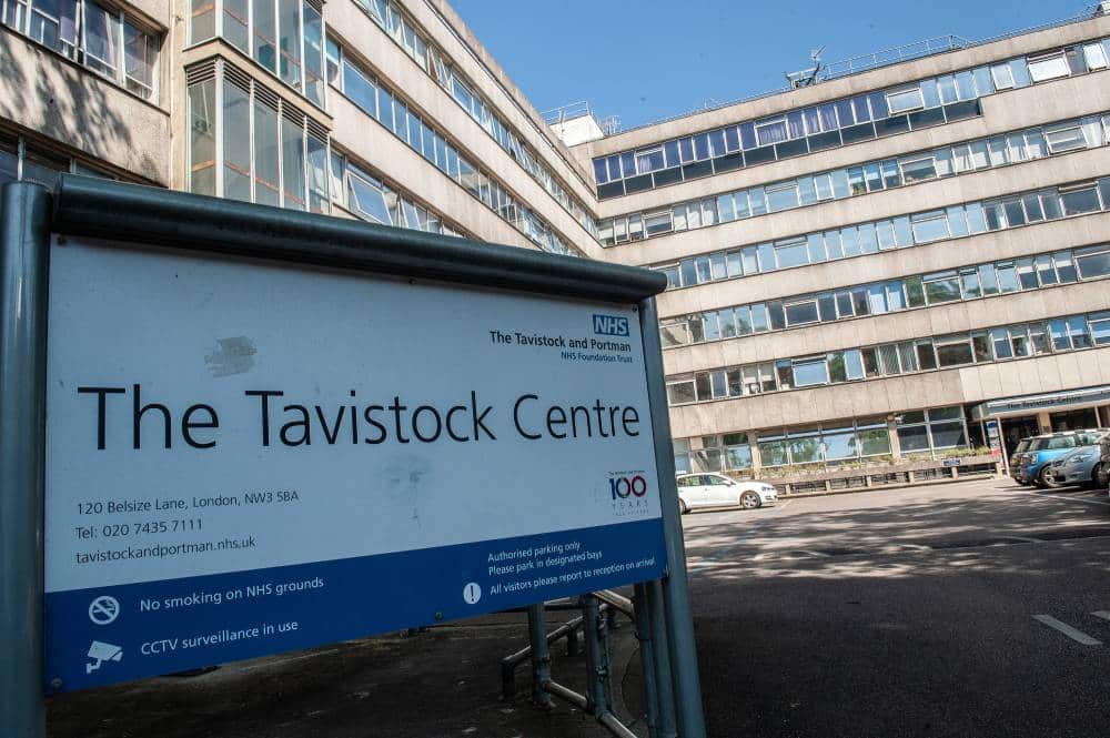 A general view outside The Tavistock Centre and a sign for the Gender Identity Development Service (GIDS) clinic at Tavistock and Portman NHS foundation trust. It is UK's only dedicated gender identity clinic for trans children and young people