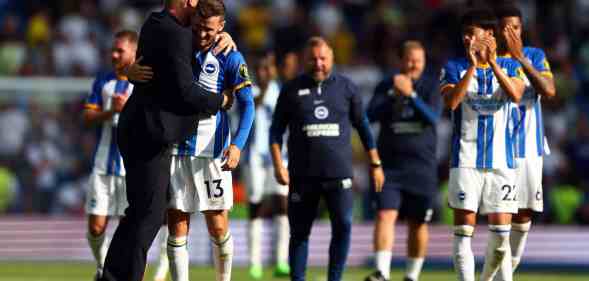 Graham Potter, manager of Brighton and Hove Albion celebrates with Pascal Gross