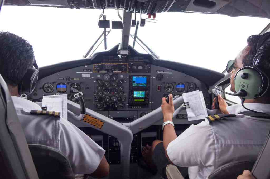 Pilots operating a commercial plane.