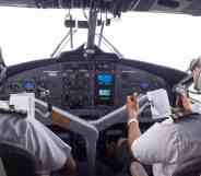 Pilots operating a commercial plane.