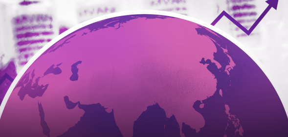 A globe, coloured in pink, with bottles of monkeypox vaccine in the background