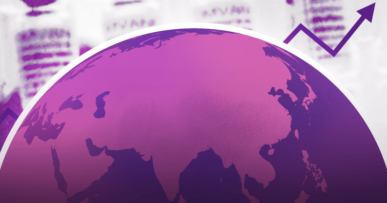 A globe, coloured in pink, with bottles of monkeypox vaccine in the background