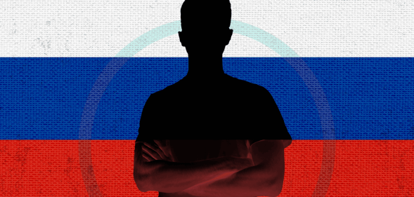 Collage of a shadowy photo of a man with crossed arms in front of a Russian flag