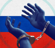 A colourised photo of blue hands in handcuffs in front of the Russian flag