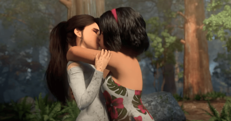 Two female characters kiss in the Netflix cartoon Jurassic World Camp Cretaceous