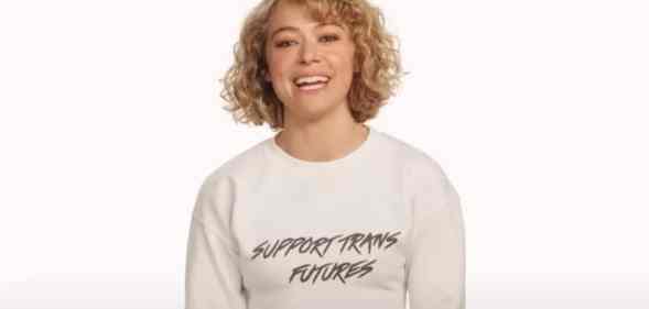Tatiana Maslany wearing a top that reads: 'Support trans futures'