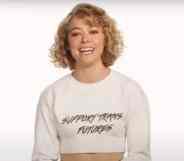 Tatiana Maslany wearing a top that reads: 'Support trans futures'