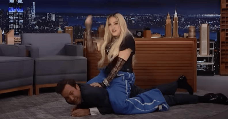 Madonna riding Jimmy Fallon.