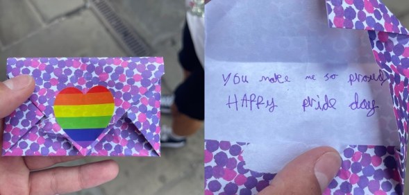 A side-by-side photo of an envelope with 'you make me so proud, happy pride day' written inside