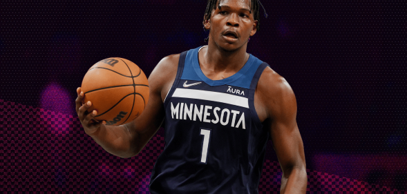 Anthony Edwards holding a basketball