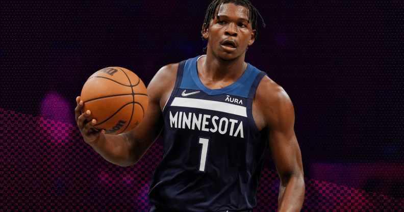 Anthony Edwards holding a basketball