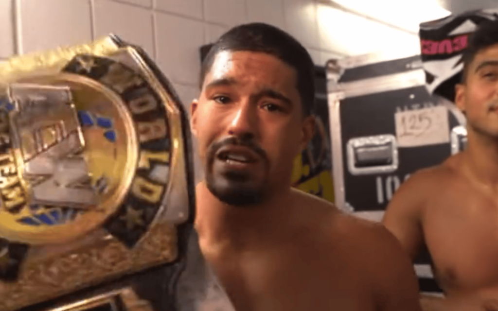 Anthony Bowens gives an emotional speech after winning the AEW titles.