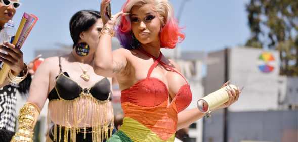 Rapper Cardi B performing with dancers in the background. (Getty)