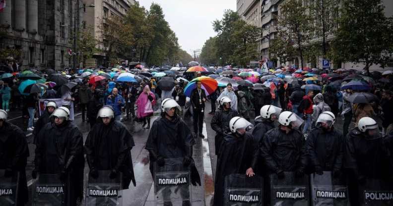 This photo shows riot police protecting participants at Belgrade Pride
