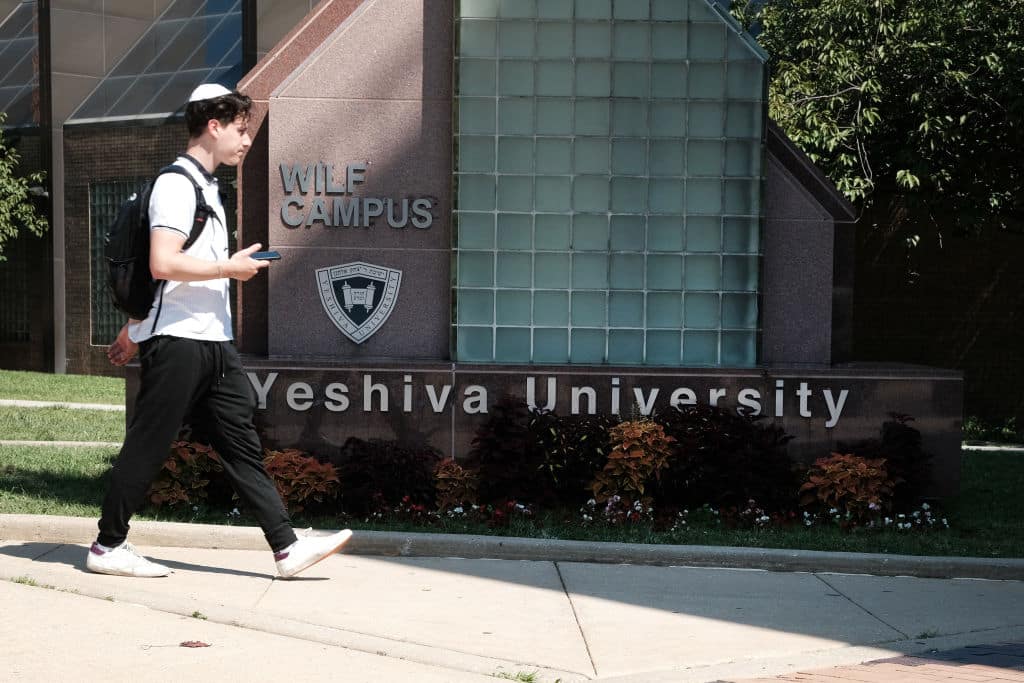 Students walk by the campus of Yeshiva University in New York City
