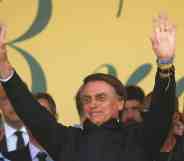 Current president of Brazil and candidate for re-election Jair Bolsonaro greets supportes during a campaign rally.