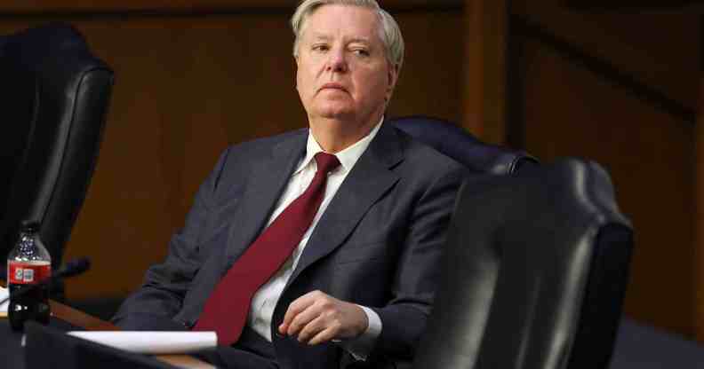 Lindsey Graham sits in a chair during a Senate Judiciary Committee on data security