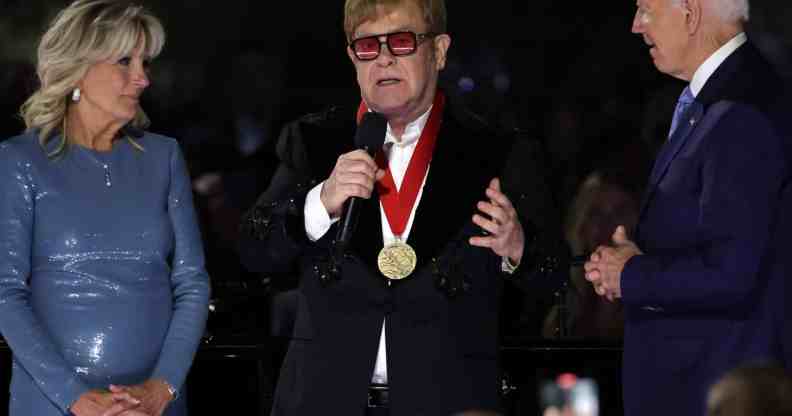 Elton John in tears as President Biden surprises him with medal at White House