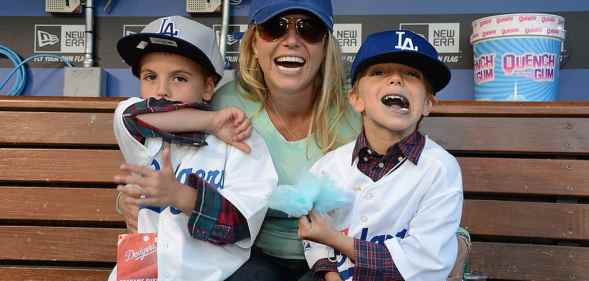 Britney Spears poses with sons Sean Preston Federline (L) and Jayden James Federline (R) during agame against the San Diego Padres at Dodger Stadium on April 17, 2013.
