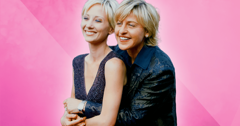 A graphic showing a cut-out image of actor Anne Heche wearing a blue dress being held by presenter Ellen DeGeneres who is dressed in dark blue suit. The pair are set against a pink background.