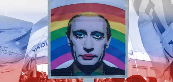A protest sign featuring a photo of Vladimir Putin in drag and a rainbow