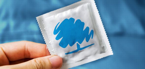 An image of a condom with the Conservative Party logo edited onto it.