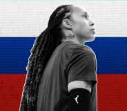 Brittney Griner infront of the Russian flag.