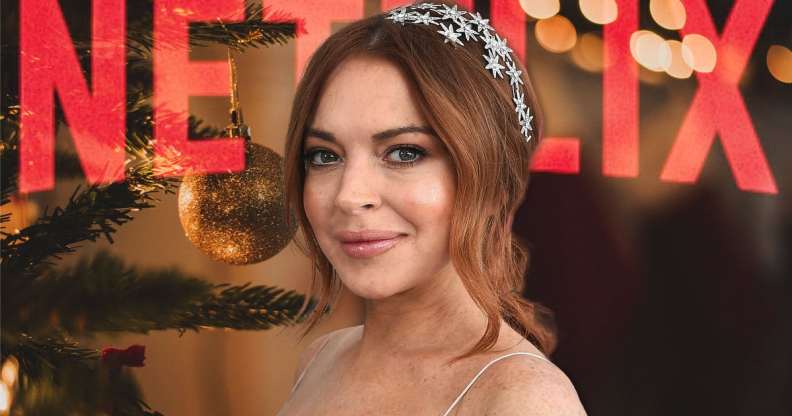 Lindsay Lohan with the word 'Netflix' spelled out behind her