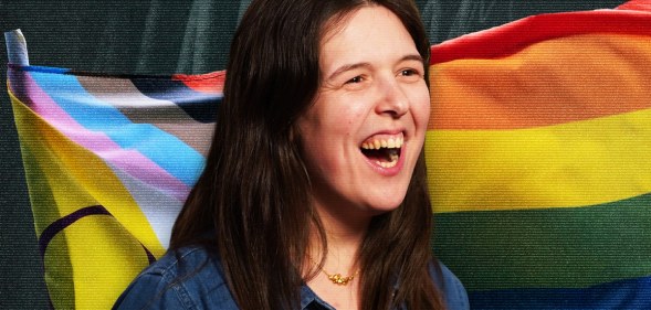 A photo of comedian Rosie Jones laid over a photo of an progress Pride flag