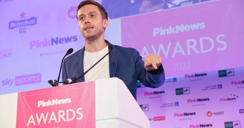 Owen Jones speaking at a lecturn