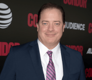 Brendant Fraser posing for a photoshoot on the red carpet