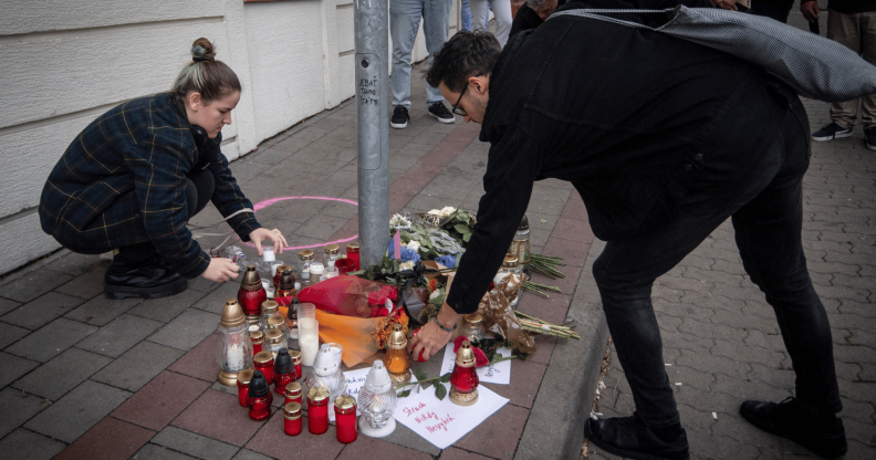 A memorial has been created on the pavement at Zamocka Street in Bratislava, Slovakia after a 'radicalised teen' shot dead two men at Tepláreň