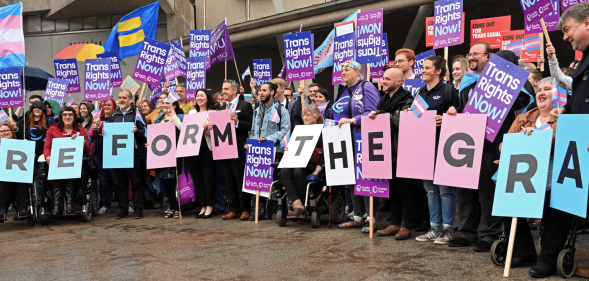 Protesters demonstrate outside the Scotish Parliament for reform of the Gender Recognition Act, in an event organised by the Scottish Trans Alliance