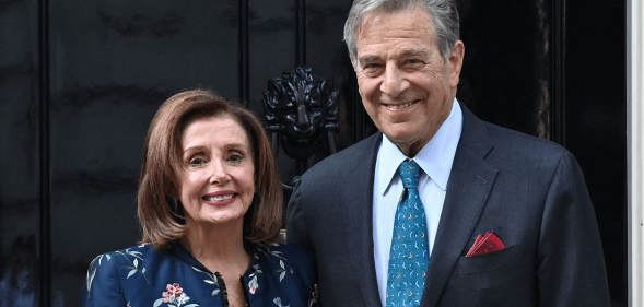 US speaker of the House Nancy Pelosi stands alongside her husband Paul outside