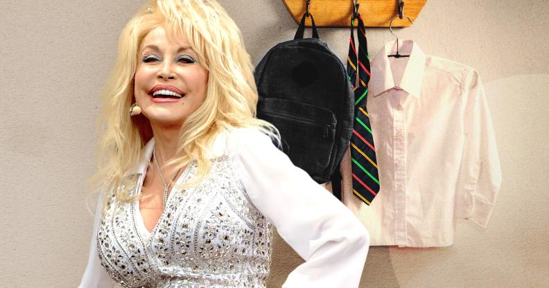Dolly Parton standing infront of hanging school uniforms