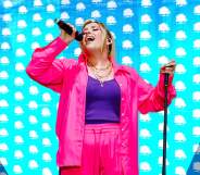 Ella Henderson performing on stage.