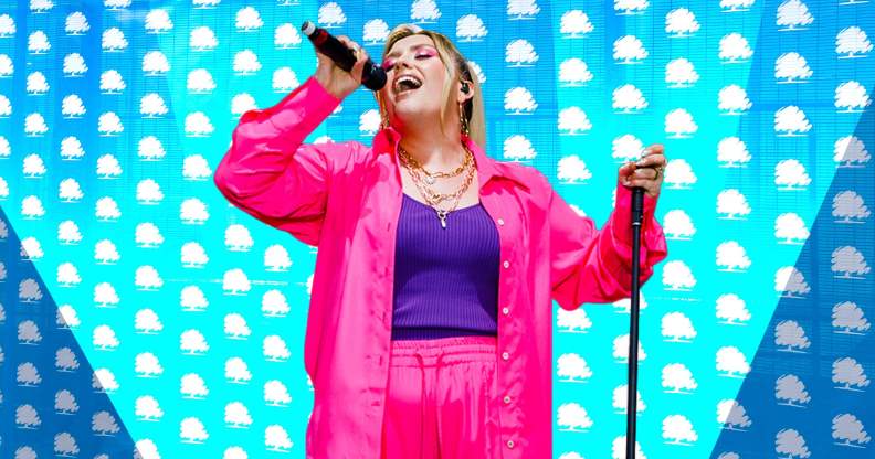 Ella Henderson performing on stage.