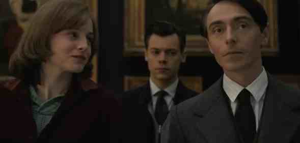 A still from the film My Policeman with actors Emma Corrin, Harry Styles and David Dawson.