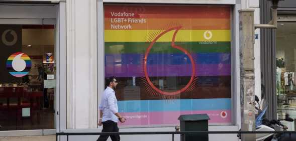 A Vodafone store with a Pride display in Greece