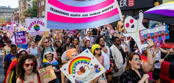Thousands of people pass through Soho on a London Trans+ Pride march from the Wellington Arch.