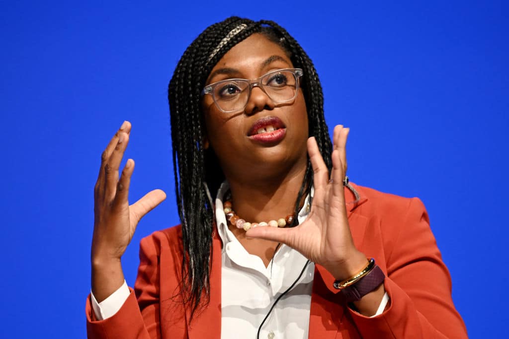 A photo of Kemi Badenoch speaking on day two of the annual Conservative Party conference on October 3, 2022.