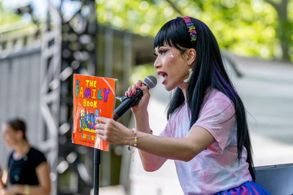 Drag queen Yuhua Hamaskai takes part in a Drag Queen Story Hour event